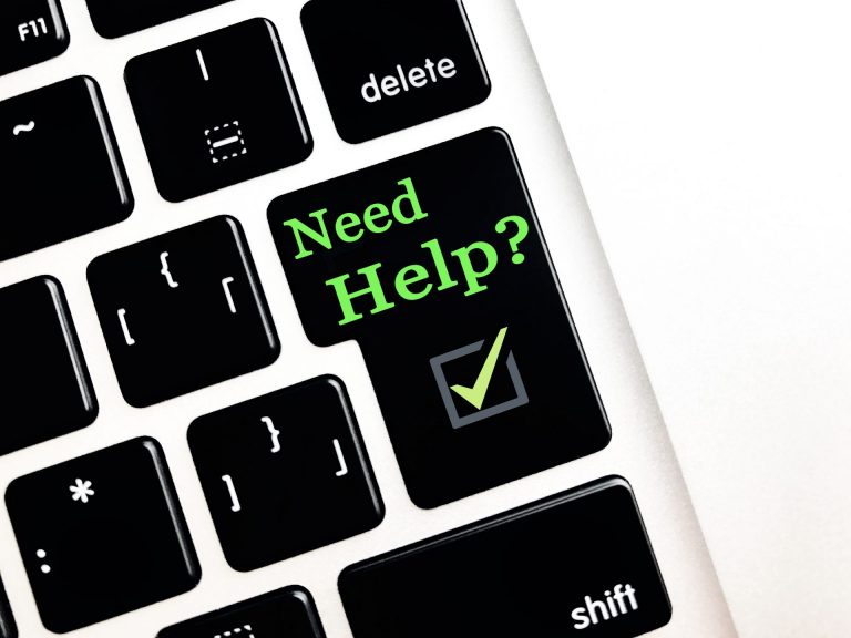 キーボードのEnterキーに書かれたNeed Help?の文字